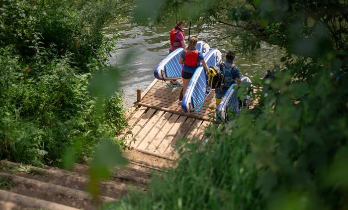 Stand-up paddle boarding at Monmouth South Wales with Inspire2Adventure top things to do near Brecon Beacons